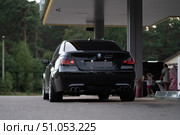 KRASNOYARSK, RUSSIA - July 31, 2025: Black BMW M5 E60. Редакционное фото, фотограф Плотников Дмитрий / Фотобанк Лори