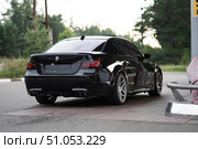 KRASNOYARSK, RUSSIA - July 31, 2025: Black BMW M5 E60. Редакционное фото, фотограф Плотников Дмитрий / Фотобанк Лори