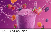 Fresh fruit smoothie splashes vibrantly against a colorful background in a lively kitchen setting. Стоковое AI-видео, аниматор Сергей Толмачёв / Фотобанк Лори