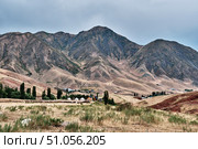 Chunkurchak gorge with eco complex and yurts in mountain landscape, Kyrgyzstan. Стоковое фото, фотограф Ирина Кононова / Фотобанк Лори