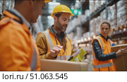 Workers take inventory in a warehouse while discussing shipment logistics in the afternoon. Стоковое AI-видео, аниматор Сергей Толмачёв / Фотобанк Лори