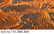 Explore a detailed and intricate sand pattern up close, showcasing the mesmerizing natural design and texture. Стоковое AI-видео, аниматор Данила Большаков / Фотобанк Лори