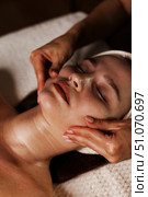Rejuvenating Facial Massage for Relaxation and Skin Wellness in a Serene Indoor Setting. Стоковое фото, фотограф Aleksandr Golubev / Фотобанк Лори