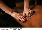 Experience the Soothing Touch of Therapeutic Massage in a Tranquil Indoor Setting for Relaxation. Стоковое фото, фотограф Aleksandr Golubev / Фотобанк Лори