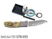 Складной нож и туристический компас на белом фоне. Knife with Rubberized Handle and Compass Isolated On White Background. Стоковое фото, фотограф Татьяна Д / Фотобанк Лори