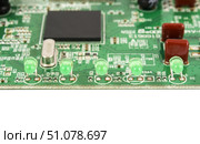 Радиодетали на печатной плате прибора. CRadio components on the printed circuit board of the device. Стоковое фото, фотограф Татьяна Д / Фотобанк Лори