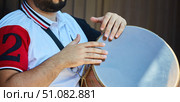 Men's hands play national music on the drum. Percussion musical instrument. Стоковое фото, фотограф Наталия Кирсанова / Фотобанк Лори