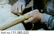 carpenter using nail gun or brad nailer tool on wood box in a workshop ,furniture restoration woodworking concept. selective focus. Стоковое фото, фотограф Feruza Tashmetova / Фотобанк Лори