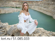 Fashion portrait of young beautiful woman posing in quarry. Стоковое фото, фотограф Андрей Аркуша / Фотобанк Лори