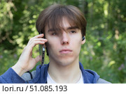 Phone fraud.Talking to phone scammers. Withdrawal of money via the Internet. Стоковое фото, фотограф Александр Поташев / Фотобанк Лори