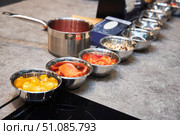 A set of ingredients for making pizza. Portioned food in metal bowls. Стоковое фото, фотограф Наталия Кирсанова / Фотобанк Лори