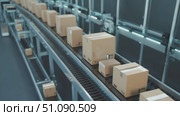 Boxes move along a conveyor belt in a modern warehouse. The automated sorting system efficiently transports packages for shipping and logistics. Стоковое AI-видео, аниматор Nart / Фотобанк Лори