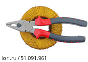 Плоскогубцы и торроидальный трансформатор на белом фоне. Pliers and a toroidal transformer on a white background. Стоковое фото, фотограф Татьяна Д / Фотобанк Лори
