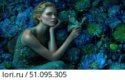 Enchanting fairy in a mystical forest surrounded by vibrant blue flowers and magical butterflies. Стоковое AI-изображение, AI-художник Ксения Лаптева / Фотобанк Лори