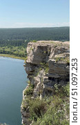 Overview vertical video of natural landmark - steep White Rocks along bank of Siberian Belaya River, near village of Kholmushino, Usolye-Sibirskoye district, Irkutsk region. Beautiful summer landscape. Стоковое видео, видеограф Виктория Катьянова / Фотобанк Лори