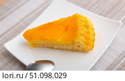 On plate is tasty sponge Catalan cream pie. Стоковое фото, фотограф Яков Филимонов / Фотобанк Лори