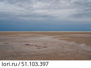 Sandy shores of the drying salt lake Baskunchak on a summer day, Nizhny Baskunchak, Akhtubinsky district, Astrakhan region, Russia. Стоковое фото, фотограф Ula Ulachka / Фотобанк Лори