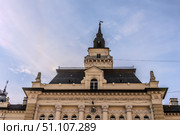 A panoramic city view of Novi Sad with its iconic bridge over the Danube River is a breathtaking sight. From this vantage point, the city sprawls beneath the sky, with the elegant Varadin Bridge connecting the two sides of the river. Стоковое фото, фотограф Feruza Tashmetova / Фотобанк Лори