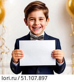 Cute happy boy in suit with bow tie with smile on face. Holding white sheet of paper. Стоковое AI-изображение, AI-художник Ирина Гильмуллина / Фотобанк Лори