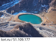 High mountain ranges with snow caps. A small mountain lake. Winter time of the year. Landscape. Стоковое фото, фотограф Наталия Кирсанова / Фотобанк Лори