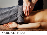 Healing Hands Provide Therapeutic Massage for Sports Injury Recovery. Стоковое фото, фотограф Aleksandr Golubev / Фотобанк Лори