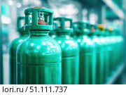Green oxygen tanks. Bundle of gas cylinder and high pressure gauges, meter, valve. Many argon cylinders with compressed gas for industry, welding. Fuel manufacturing. Liquefied gas production, factory. Стоковое AI-изображение, AI-художник Марина Демидюк / Фотобанк Лори