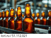 Beer Bottling plant. Brown Beer Bottles in rows. Bottling process in modern factory. Capped Glass Beer Bottles ready for distribution in a brewery. Manufacturing. Production of beer in a glass bottle. Стоковое AI-изображение, AI-художник Марина Демидюк / Фотобанк Лори