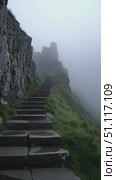 Stairway leading to ancient ruins on a misty mountain in a serene landscape. Стоковое AI-видео, аниматор Сергей Толмачёв / Фотобанк Лори