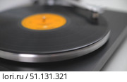 Vinyl Record Spinning On Vintage Turntable. Needle Scratching Grooves Analog Sound. Стоковое видео, видеограф Степанов Григорий / Фотобанк Лори