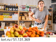 Woman in the store holding her stomach. Стоковое фото, фотограф Яков Филимонов / Фотобанк Лори