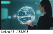 A woman stands in silence, contemplating something important in a softly illuminated room. Стоковое AI-видео, аниматор Данила Большаков / Фотобанк Лори