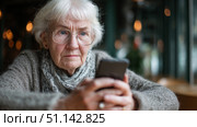 Пожилой женщине позвонили мошенники. An elderly woman got a call from scammers. Стоковое AI-изображение, AI-художник Смирнова Светлана / Фотобанк Лори