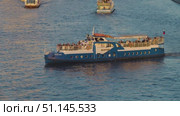 Moscow, Russia - August 15, 2025: A white boat with blue trim and passengers on deck, sailing on calm water. Редакционное видео, видеограф Олег Альбертович Потаскуев / Фотобанк Лори
