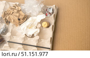 Cardboard plastic paper wood wrapper aluminum cellophane. Garbage that is recyclable. In secondary raw materials. Стоковое фото, фотограф Скрипачев Антон / Фотобанк Лори