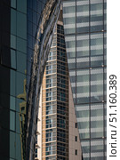 Different glass walls of buildings. Architecture details. Abstract background. Стоковое фото, фотограф Екатерина Якименко / Фотобанк Лори