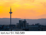 FRANKFURT, GERMANY - JUNE 12, 2025: Europaturm Telecommunications Tower in Frankfurt at Sunset. Редакционное фото, фотограф Максим Забаровский / Фотобанк Лори