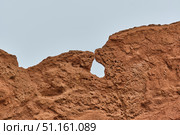 Natural red rock formation in Fairy Tale Canyon, Kyrgyzstan, associated with kiss. Стоковое фото, фотограф Ирина Кононова / Фотобанк Лори