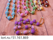 Beads made of felted wool, handmade. Creativity and hobbies. Стоковое фото, фотограф Наталия Кирсанова / Фотобанк Лори