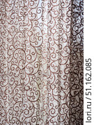 curtain drape of fabric hanging on the window. Стоковое фото, фотограф Наталия Кирсанова / Фотобанк Лори