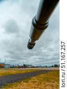 The barrel of the tank is pointed at the sky against the background of clouds. Belarus. Minsk. 10.08.25. Редакционное фото, фотограф Ярославский Максим / Фотобанк Лори