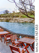 Restaurant coffee shop open air overlook Moraca River in Podgorica in Montenegro. Стоковое фото, фотограф Spirit River / Фотобанк Лори
