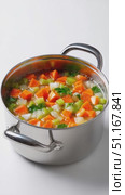 Colorful vegetable medley simmering in stainless steel pot, golden carrots, emerald celery, purple onions creating vibrant, wholesome cooking scene. Стоковое AI-видео, аниматор Юрий Поздников / Фотобанк Лори