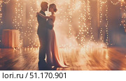 A couple shares an intimate dance surrounded by sparkling lights at a wedding celebration. Стоковое AI-видео, аниматор Данила Большаков / Фотобанк Лори