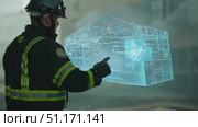 A firefighter manages the scene of an emergency filled with smoke in a city setting. Стоковое AI-видео, аниматор Данила Большаков / Фотобанк Лори