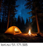 Camping in the forest. Tourist tent against the backdrop of the night starry sky. Fire. Стоковое AI-изображение, AI-художник Ирина Гильмуллина / Фотобанк Лори
