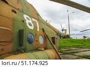 An old Soviet MI-8 combat helicopter. Close-up. Belarus. Minsk. 09.08.2025. Редакционное фото, фотограф Ярославский Максим / Фотобанк Лори