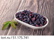 Sweet juicy ripe honeysuckle berries. Стоковое фото, фотограф Андрей Старостин / Фотобанк Лори