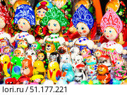 Gorodets, Russia - June 23rd, 2018. Traditional handicraft wooden souvenirs at street gift store near complex "City of Craftsmen" on the banks of the Volga River. Редакционное фото, фотограф Denis Vostrikov / Фотобанк Лори