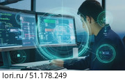 A programmer is immersed in coding at sunset, surrounded by dual monitors showcasing intricate software development. Стоковое AI-видео, аниматор Данила Большаков / Фотобанк Лори