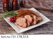 Baked pork sirloin with cornus. Стоковое фото, фотограф Андрей Старостин / Фотобанк Лори
